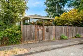 Fully fenced yard. Large private front yard