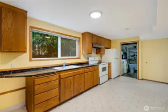 2nd kitchen on lower level with it's own private entry on the lower level leading to a deck.