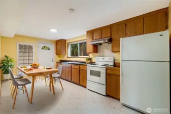 2nd Kitchen on lower level.  You could rent out the lower level with the 2 bedrooms and separate laundry separate entrance (virtually staged)