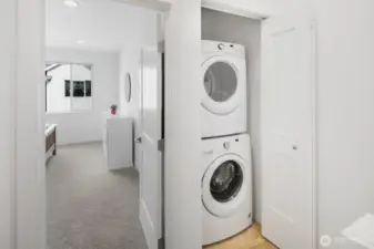 Laundry conveniently located on the upper floor.