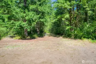 Entrance to your level & expansive property.  Room for large gatherings! Old Cascade Hwy IS plowed by King Co.