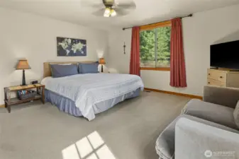 Primary Bedroom with exterior door to private patio