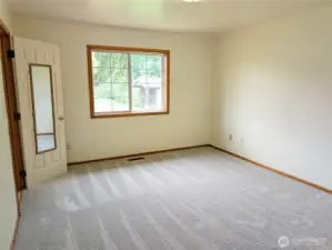Large primary bedroom. New carpets installed 7/18!