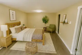 Primary bedroom on ground level *virtually staged