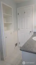 lots of storage in full bath