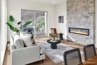 Cozy fireplace and stunning stone surround