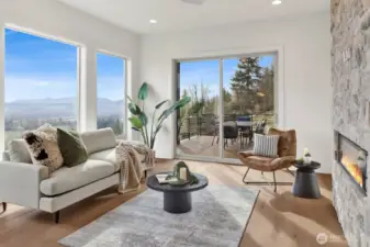 The great room opens to a large deck for enjoying the view