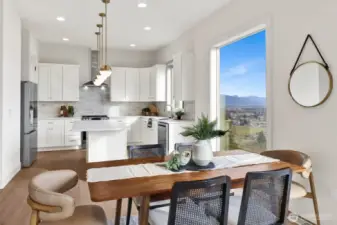 Chef's kitchen is open to the dining room