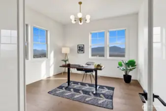 On the main level there is a large, bright office adjacent to the front entry