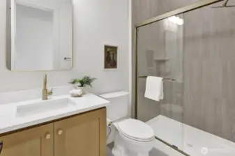 Across the hall from the bedroom, find a large 3/4 bathroom