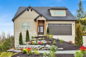 Fully professionally landscaped, tis home has amazing curb appeal