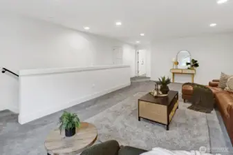 The family room is open to the staircase