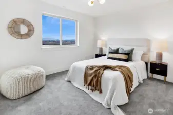 Upstairs find secondary bedroom #2...large and facing the view