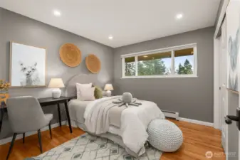 As you head down the bedroom wing, this is the first bedroom on your right-