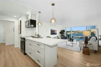 New cabinets, new appliances, new quartz countertops, new sink, new lighting, and new luxury vinyl plank flooring!