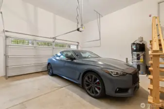 Finished garage with garage door opener. High-efficiency water heater installed!