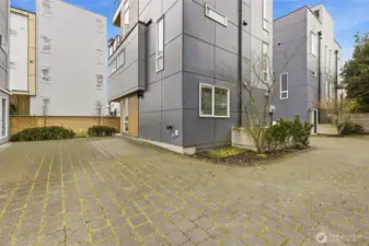 Parking pad with EV charger.