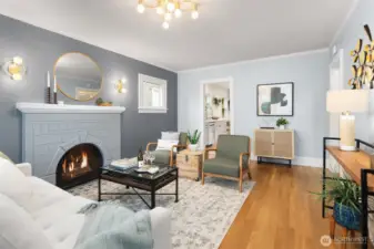 Designer lighting and paint colors create a soothing living room vibe