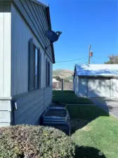 Detached garage with shared driveway