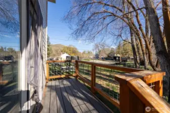 Small deck off of primary bedroom could be perfect for your morning coffee.