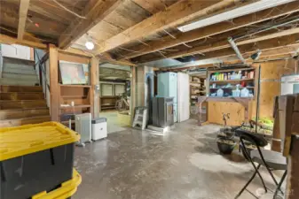 Basement has many potential uses. Access stairs inside by front door plus additional exterior access from carport.