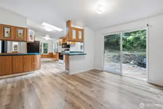 Small breakfast bar leading into kitchen