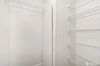 Walk-in closet in primary suite
