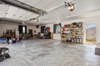 3 bay garage, room for vehicles and lots of necessary stuff... including swimming pool mechanics.