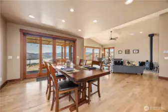 Dining area with large sliding French doors that lead to the patio.