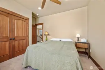 Another guest room on the upper floor, double closets.