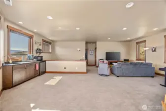 Bonus room is equipped with a wet bar, small fridge and microwave.