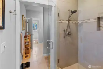 Tiled shower and radiant floor.