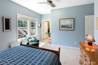 Guest bedroom with door to studio/den.