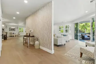 Upon entering, you are wowed by the spacious floorplan with engineered hardwood and high ceilings.