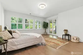 The primary suite is flooded with natural light, ample space and has access to the covered back portch.