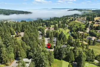 Submerged just off the golf course, you'll love the proximity to trails, water and be embraced by this warm community!