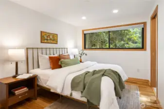 One of two bedrooms on the lower level, nice and spacious with its own ensuite bathroom!