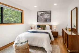 Second lower level bedroom. This layout is great to give guests or teenagers their own separate, private space!