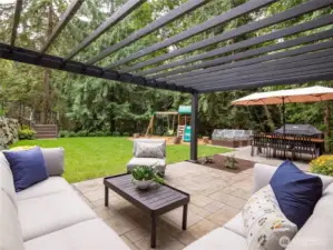 Relax under the pergola while taking in the sights and sounds of nature - you'll truly feel worlds away from it all!