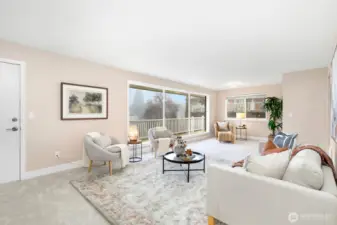 Large windows flood the space with natural light and offer views of the upper deck