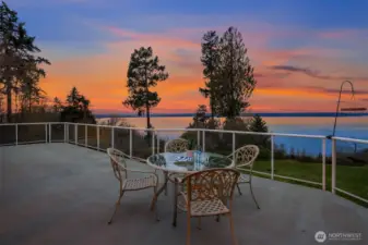 Or, move the party outside! Your spacious deck is the perfect space to host summer evenings!