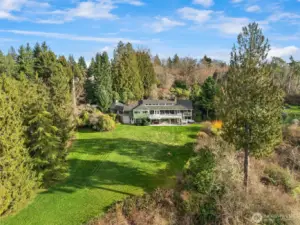 Situated on over 3 acres of lush greenery with endless views of the sound and mountains.