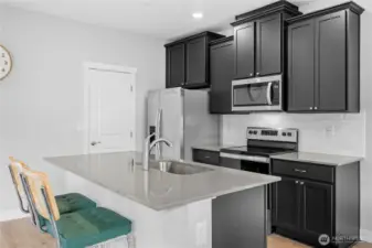Modern finishes and an open layout make this kitchen perfect for everyday living and entertaining.