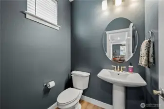 Convenient main-level powder room for guests.