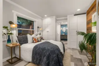 Primary bedroom with custom builts ins