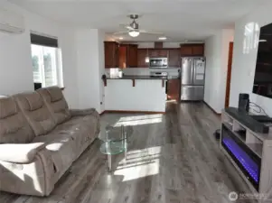 Open Great Room design with LVP through-out the home.