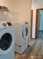 Hallway with the washer and dryer.