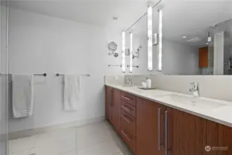 Primary suite bathroom with heated tile flooring!