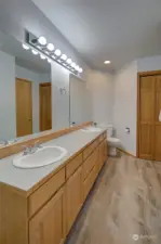 Primary bathroom is large, with dual vanity, insta-hot and more storage.