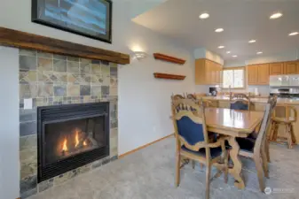 Living room also has a cozy propane fireplace with gorgeous stone surround.